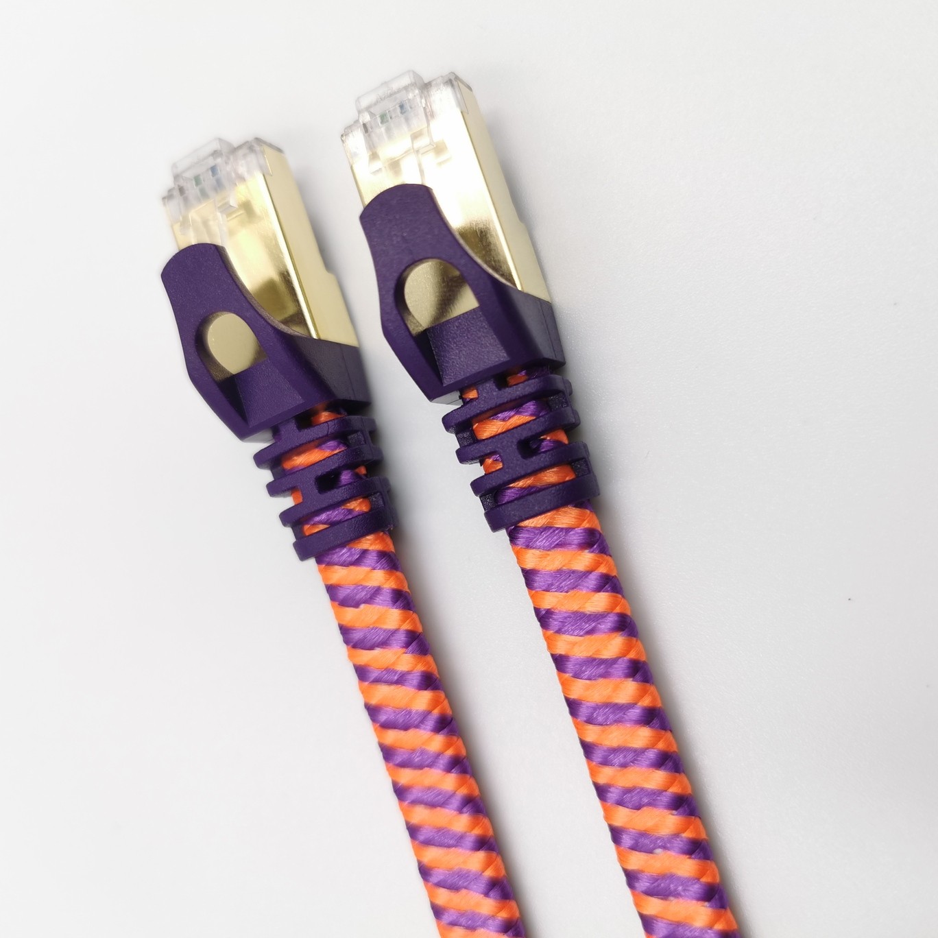 Cat7 Shielded Flat Ethernet Cable - 10Gbps 600MHz S/FTP Ultra-Slim Network Cord with Customizable Molds, Colors, and Lengths Image 2 Cat7 Shielded Flat Ethernet Cable 10Gbps S/FTP High-Speed Patch Cord