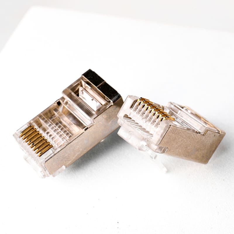 Cat5e Shielded Pass-Through RJ45 Connector - Premium 8P8C STP Modular Plug for Easy & Reliable Network Termination Image 2 Crimping a Cat5e Shielded Pass-Through RJ45 Connector on STP Network Cable