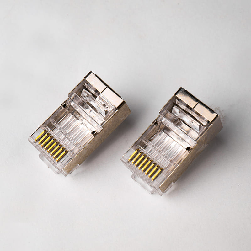 Cat6 Shielded Pass-Through RJ45 Connector - High-Performance Staggered 8P8C STP Modular Plug with 50μ" Gold Plating Image 4 Wires Passing Through Front of Cat6 Shielded Pass-Through Modular Plug