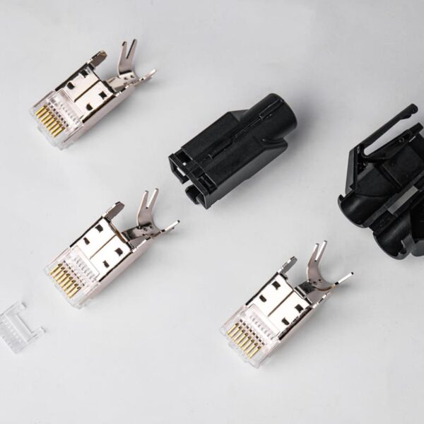 German-style 3-piece industrial modular plug components: body, load bar, boot